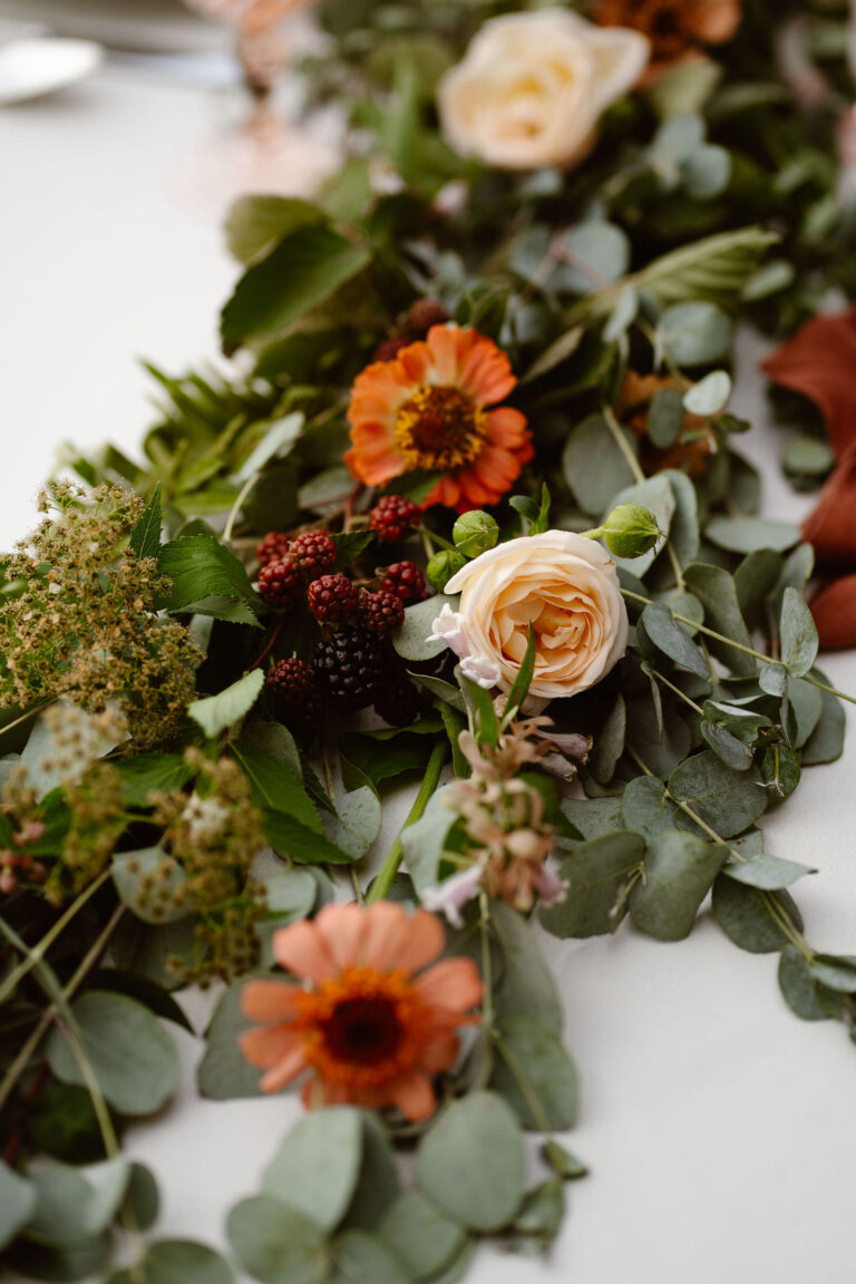 florals on a table during a mt rainier micro wedding reception dinner
