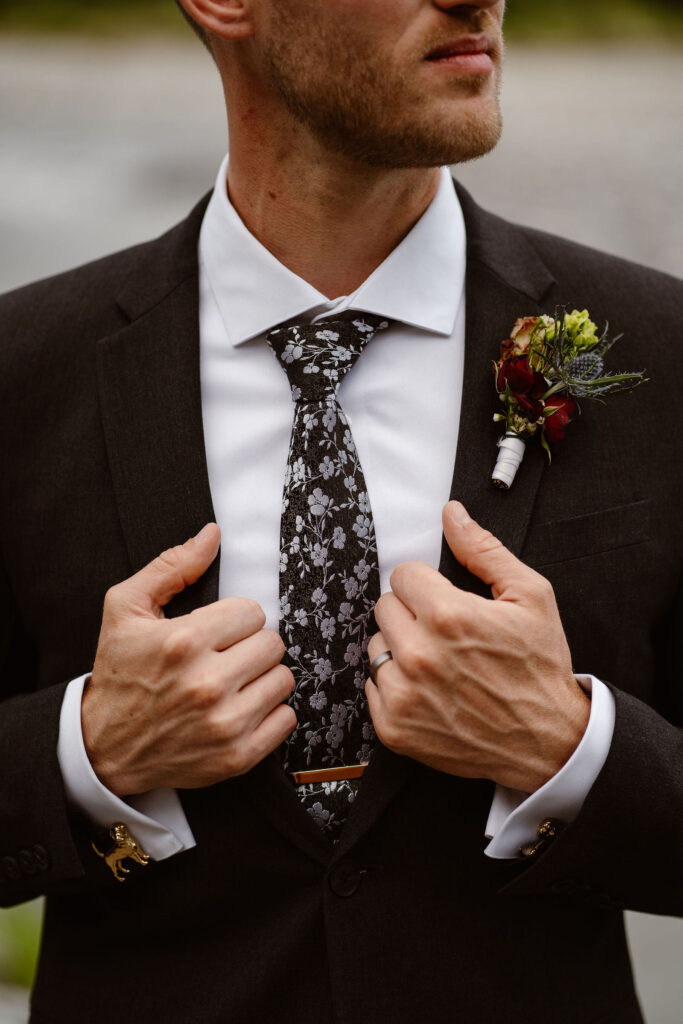 close-up photo of a groom's attire during a mt rainier micro wedding