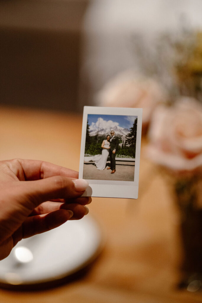 polaroid of a bride and groom posing on the steps of Paradise during their mount rainier micro wedding